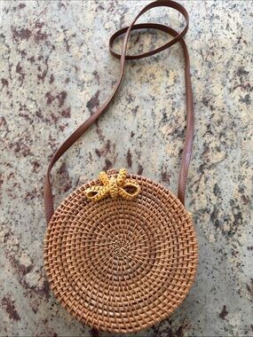 Round Woven Crossbody Bag in Brown with Bow Accent